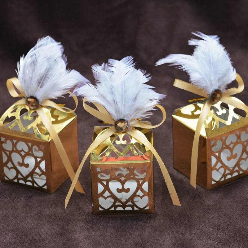 

Creative European pesonality wedding hollow candy boxes laser carving feather gold party Favors Gifts iridescent paper Candy box