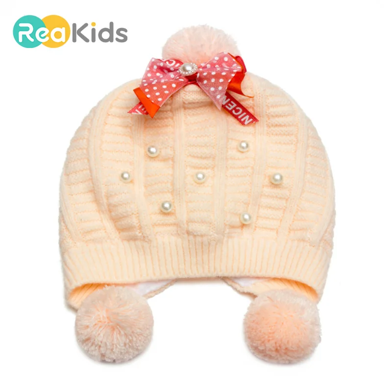 

REAKIDS Children Winter Cap Knitted Baby Cashmere Pearl Ear Protector New baby boys and girls Newborn Pom Pom beanie for girls