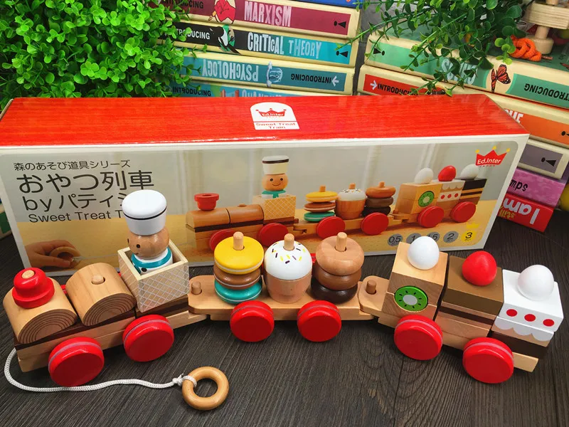 

Snacks stacked with building blocks, three trains, children's puzzle matching toys