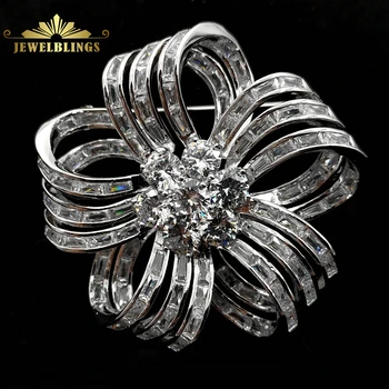 

Edwardian Vintage Silvertone Baguette Cut Clear CZ Trio Ribbon Shaped Flower Brooch 5- Petal Floral Pin Wedding Bridal Jewelry