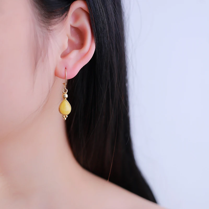 

JIUDUO jewelry Elegant and soft natural amber beeswax sterling silver and more precious gold blood Po earrings specials