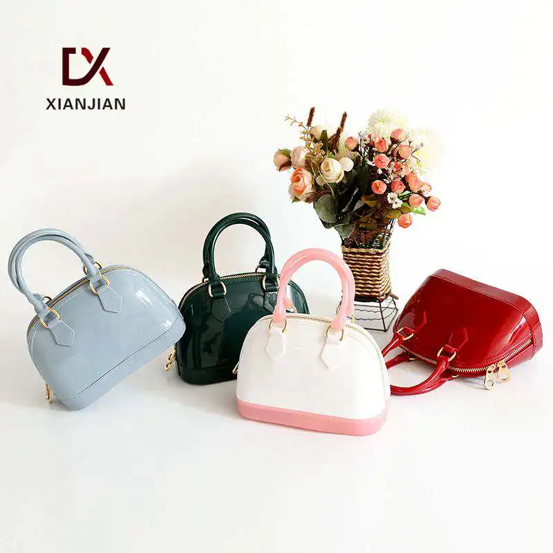 

Xianjian 2017 Summer Mini Small Semi Transparent PVC Jelly Shell Shaped Glitter Hand Bag Handbags XJJY44