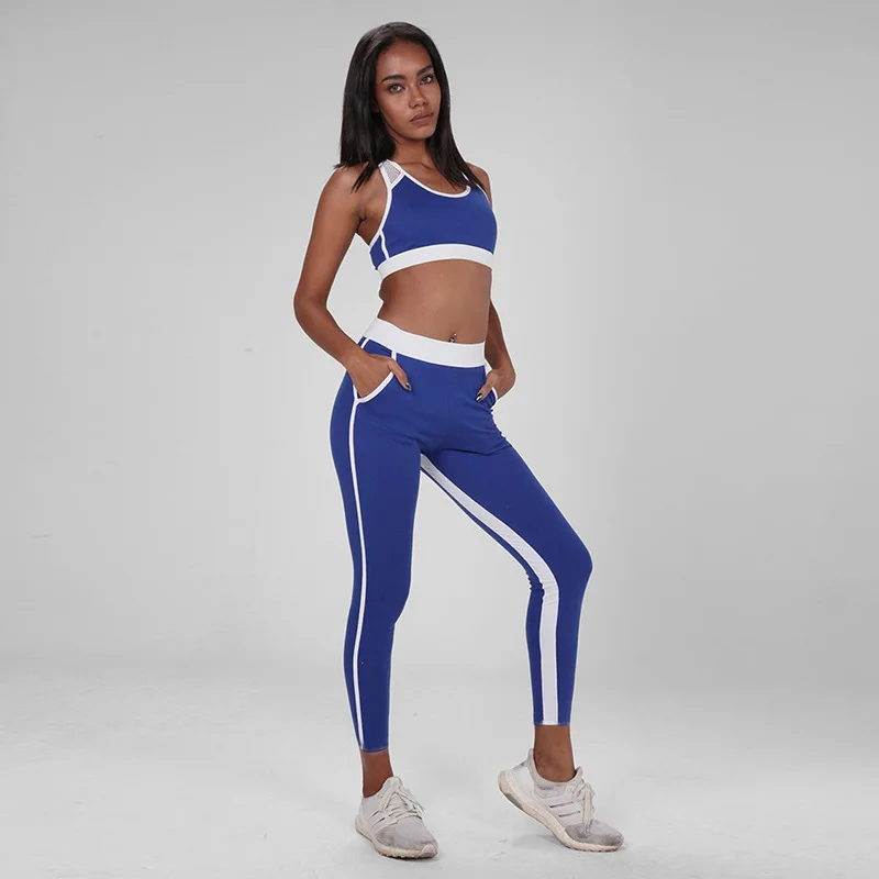 

2018 Women Fitness Sportswear Two Pieces Suits Hollow Out Patchwork Top And Elastic Striped Patchwork Leggings Tanksuits