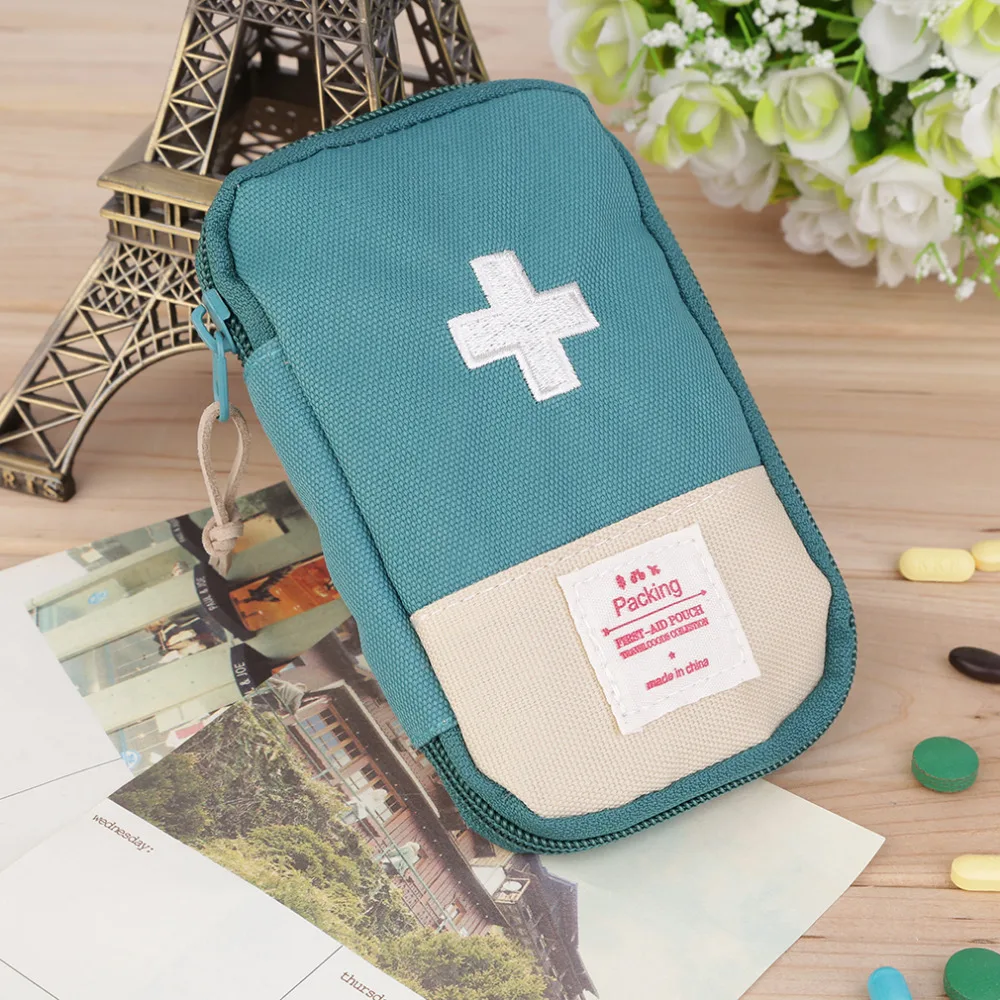 Durable al aire libre Camping hogar supervivencia portátil Kit de primeros auxilios estuche práctico Mango para facilitar el transporte 3 colores opcional
