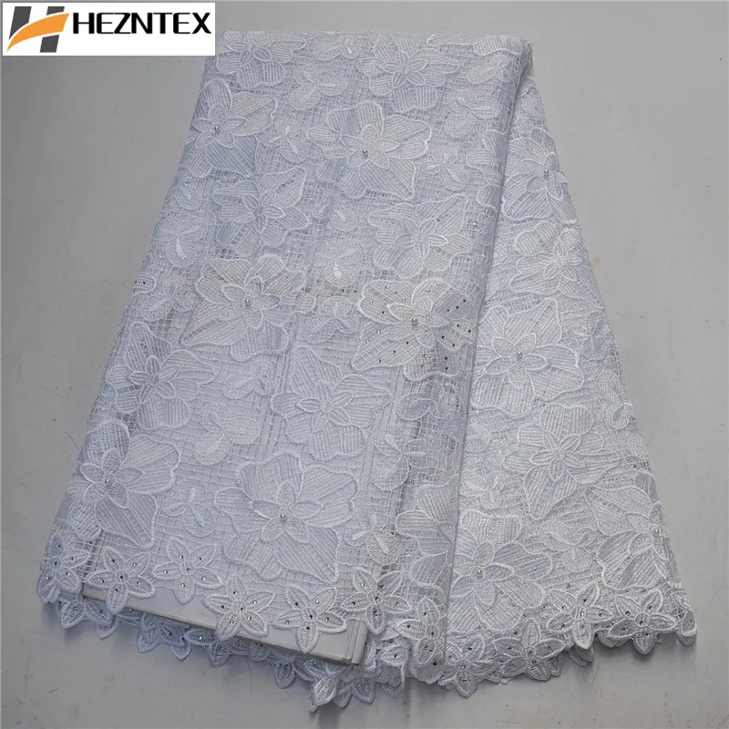 

2019 Latest White French Nigerian Guipure Laces Fabrics High Quality African Cord Laces Fabric With Stones For Wedding PSA577-1
