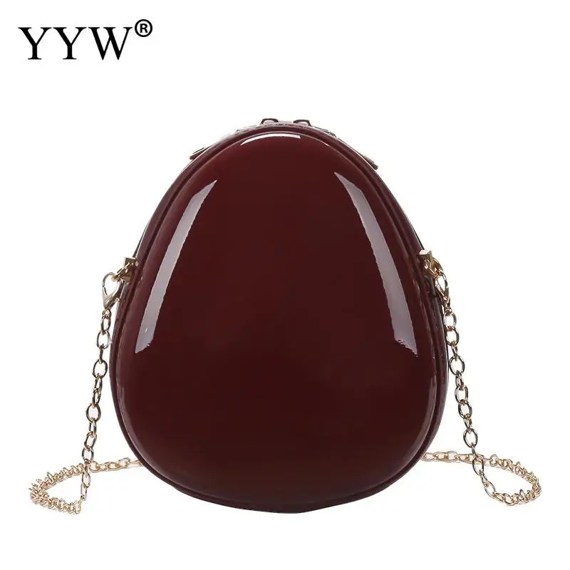 red crossbody bag with gold chain