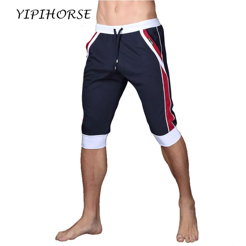 

2pcs/lot New Summer leisure Sporting shorts men Gyms trousers elastic brand men shorts Gyms mens fashion quick dry outer wear