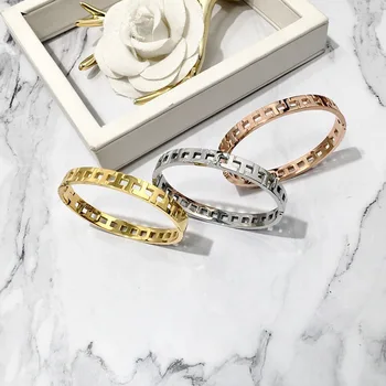 

Top Quality Hollow T Letter Band Gold Color Stainless Steel Bangle Bracelet For Women Fashion Brand Jewelry