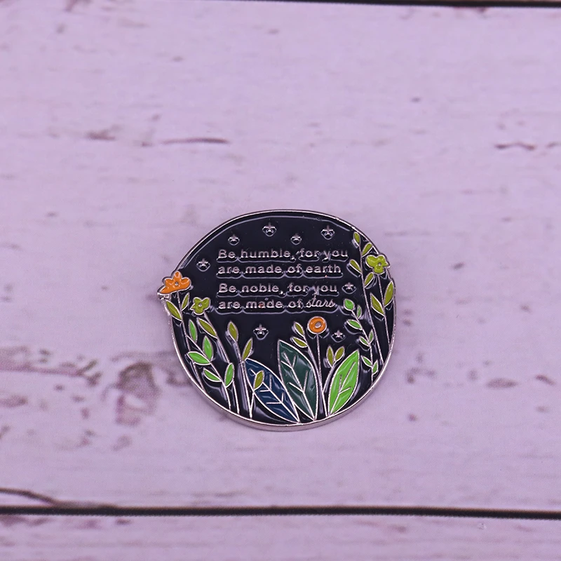 

Be humble for you are made of earth, be noble for you are made of stars button badge Serbian quote enamel pin