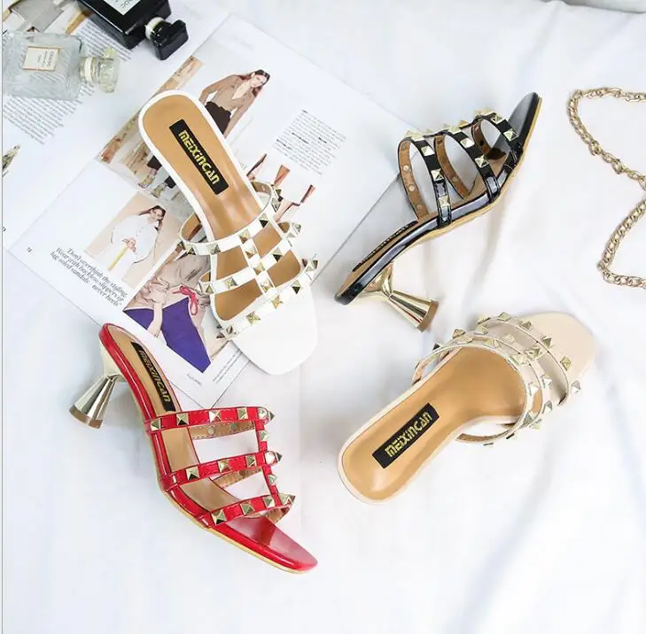

High-heeled slippers women wear 2019 new summer rivet sandals and slippers fashion wild patent leather Roman shoes