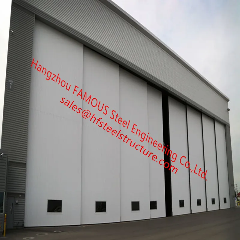 very-large-airplane-hangar-door-bottom-rolling-panel-door-well-bilt-industries__