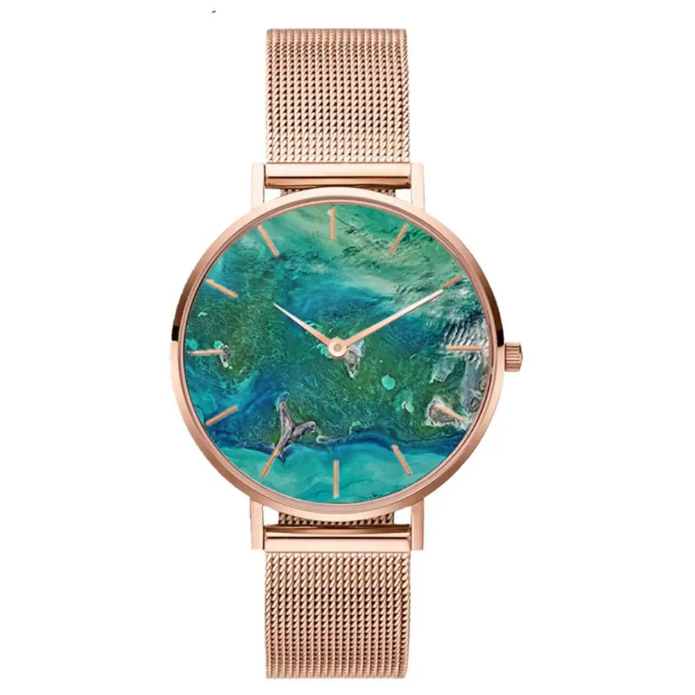 

Coral Shell Fashion Women Stainless Steel Mesh Band Casual Quartz Wrist Watch Wholesale