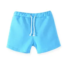 Летние детские хлопковые шорты для мальчиков и девочек; модные однотонные Короткие штаны ярких цветов для маленьких мальчиков и девочек; повседневная одежда