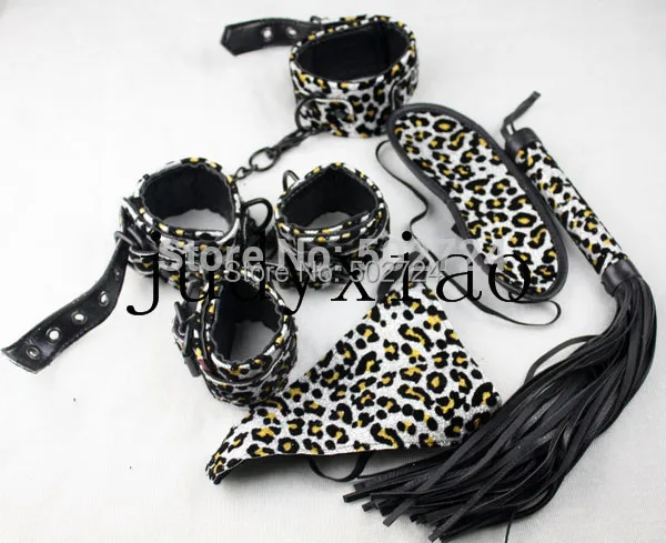 

Adult Games 5 in 1 Silver Leopard Line Kit Hand Wrist Cuffs Leg Cuffs Whip Eyemask Toy