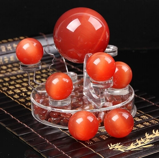

Kaiguang red cat eye stone ball set pieces,red agate broken stone seven star array, classical fengshui pendulum transport