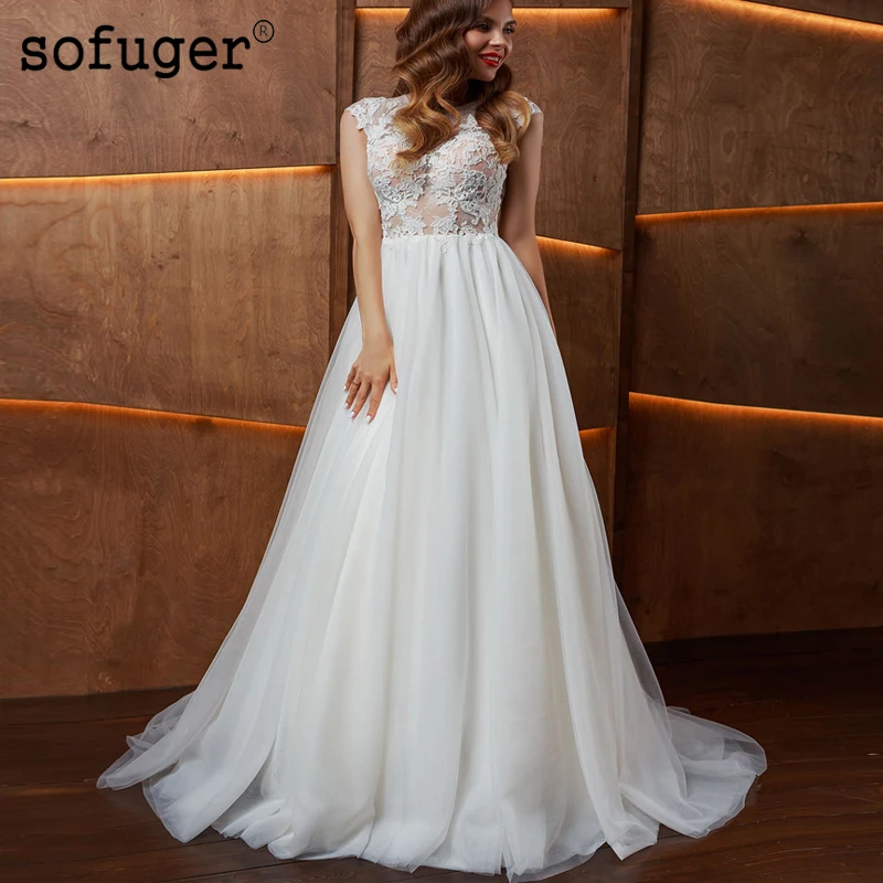 

Graceful Tulle Scoop Appliques Cap Sleeves Wedding Dress Robe De Mariee Sofuge Boho Dubai Arabic Abiti Da Sposa Long