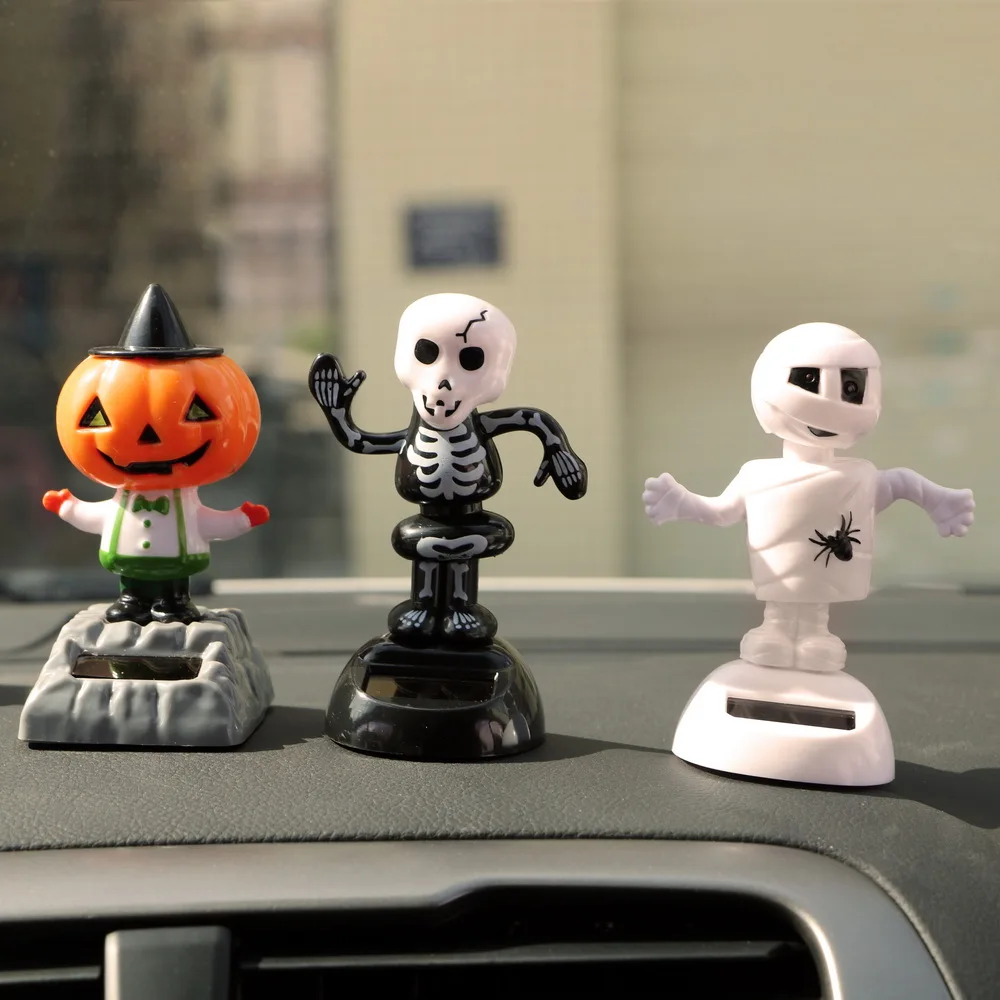 

Car Ornaments Halloween Shook Head Doll Solar Powered Bobble Dancer Automobiles Interior Accessories Car Dashboard Decor Toys