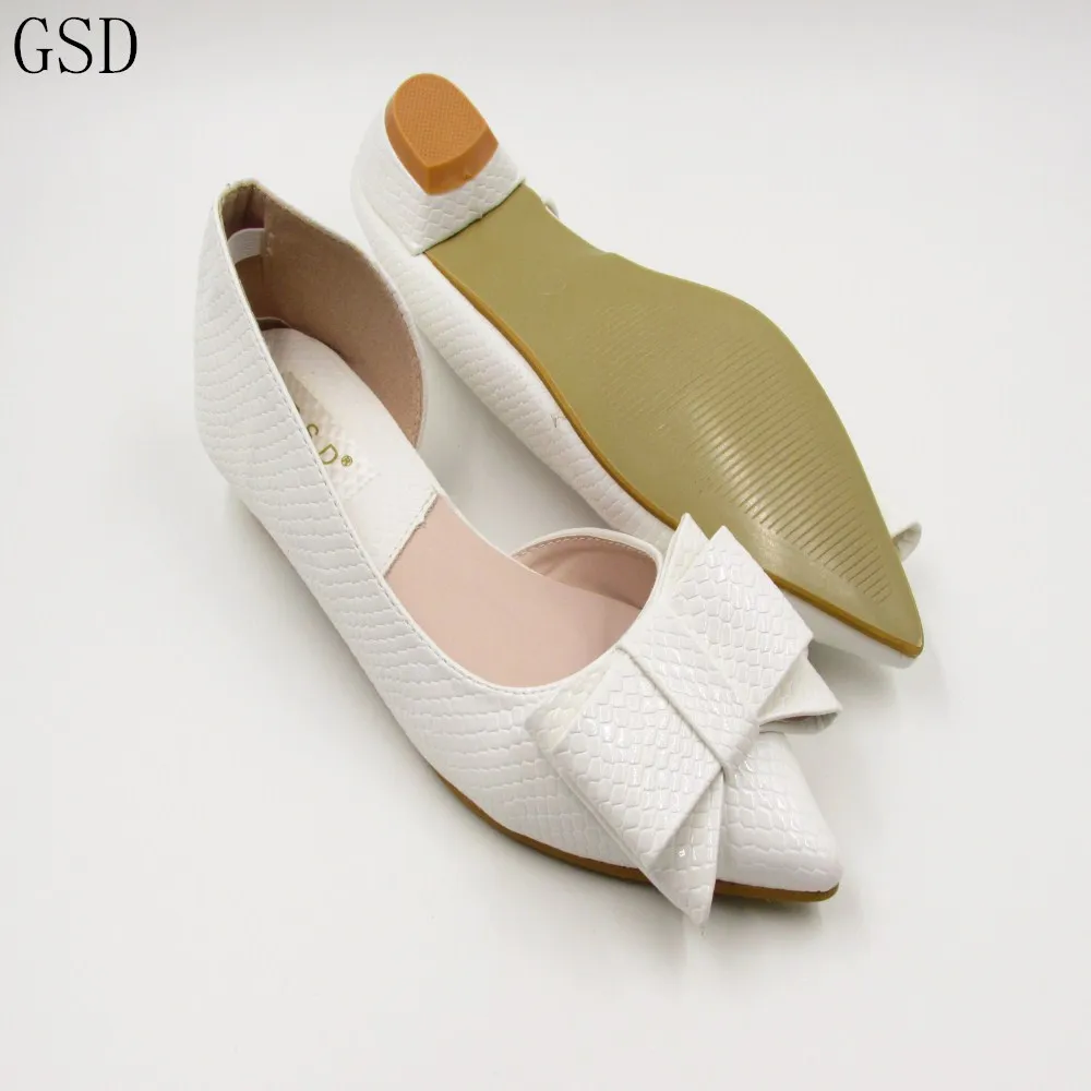 flat black and white shoes