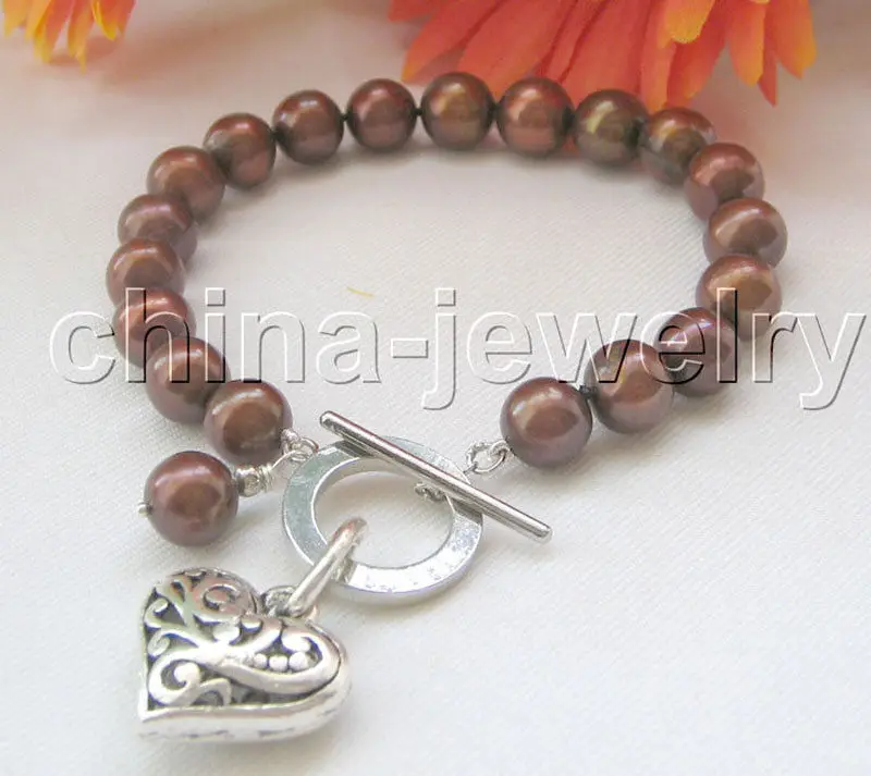 

Free Shipping >>>>>8" 9-10mm coffee round freshwater pearl bracelet-GP clasp