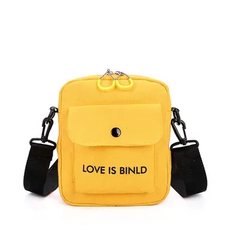 

Amorvivi Canvas bag creative rivet canvas bag casual wild shoulder bag with earphone hole letter diagonal cross bag