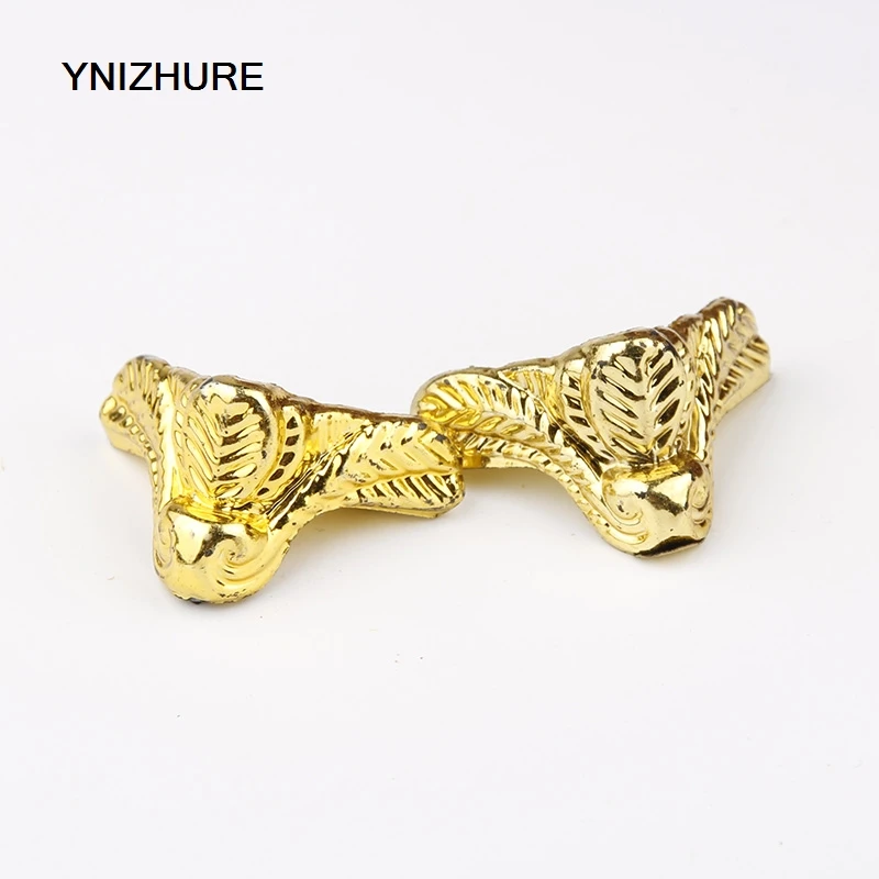 

30pcs 24*30mm Antique Wood Box Golden plastic material leaves pattern Feet Leg Corner Protector Triangle Rattan