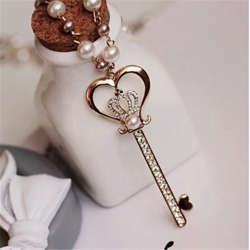 

Fashion Gold Color Crown Crystal Pendant Necklaces for Women Long Alloy Simulated Pearl Jewelry Key Shape Statement Necklace