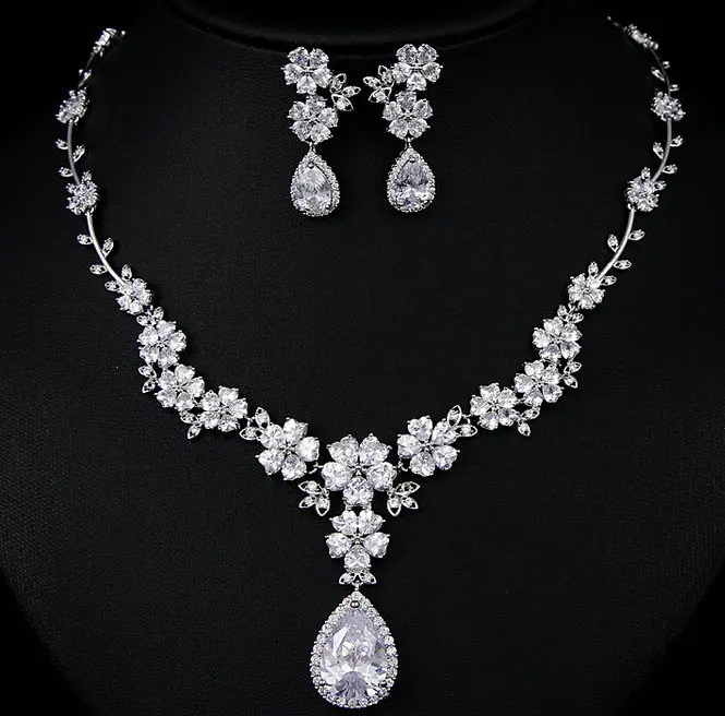 Новый дизайн красивый сверкающий цветок свадебные серьги ожерелья ювелирных изделий, наивысшего качества ААА CZ Белый цвет золотистый ювел... Новый дизайн красивый сверкающий цветок свадебные серьги ожерелья ювелирных изделий, наивысшего качества ААА CZ Белый цвет золотистый ювел...