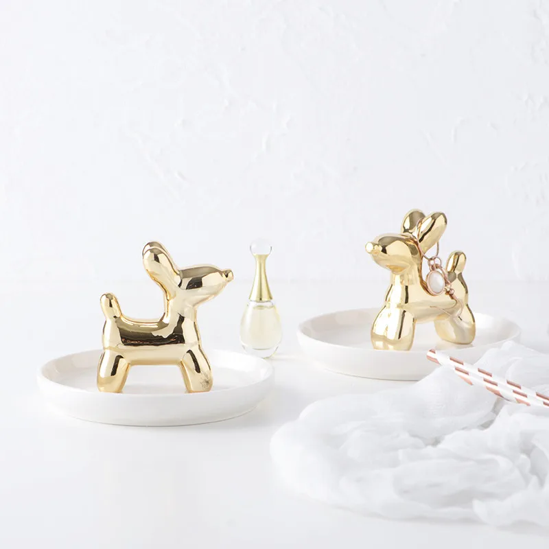 16  Ceramic jewelry dish             (4)