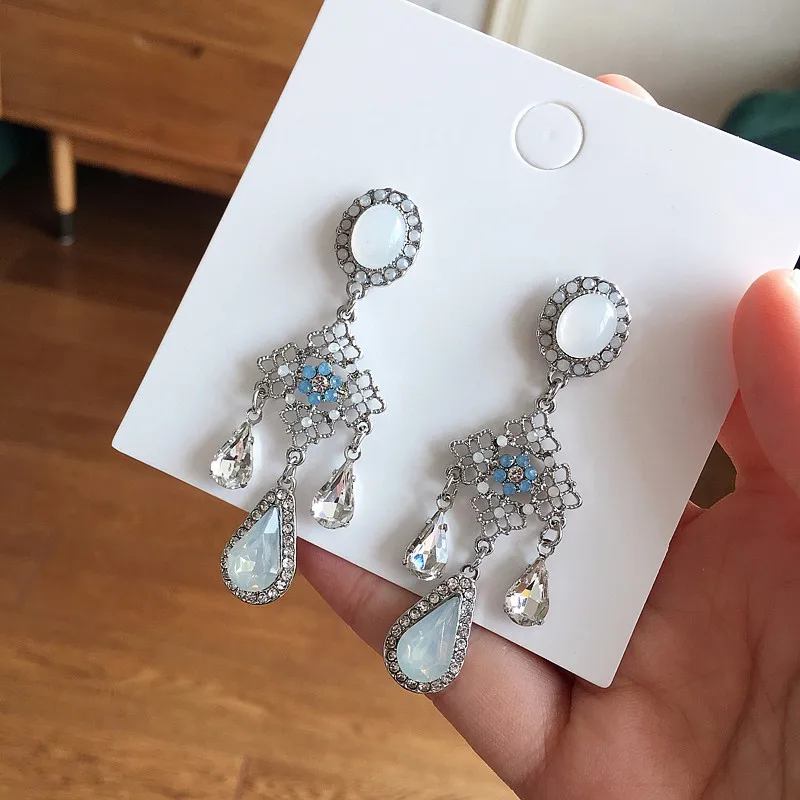 

Dominated 2019 Exquisite Temperament Vintage Water Drop Metal Hollow out Crystal Women Drop earrings