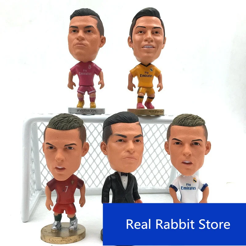 

[Top] Collection 4pcs/lot 6.5cm five kinds of different style Madrid Cristiano Ronaldo Action Figure Jersey Football star toy