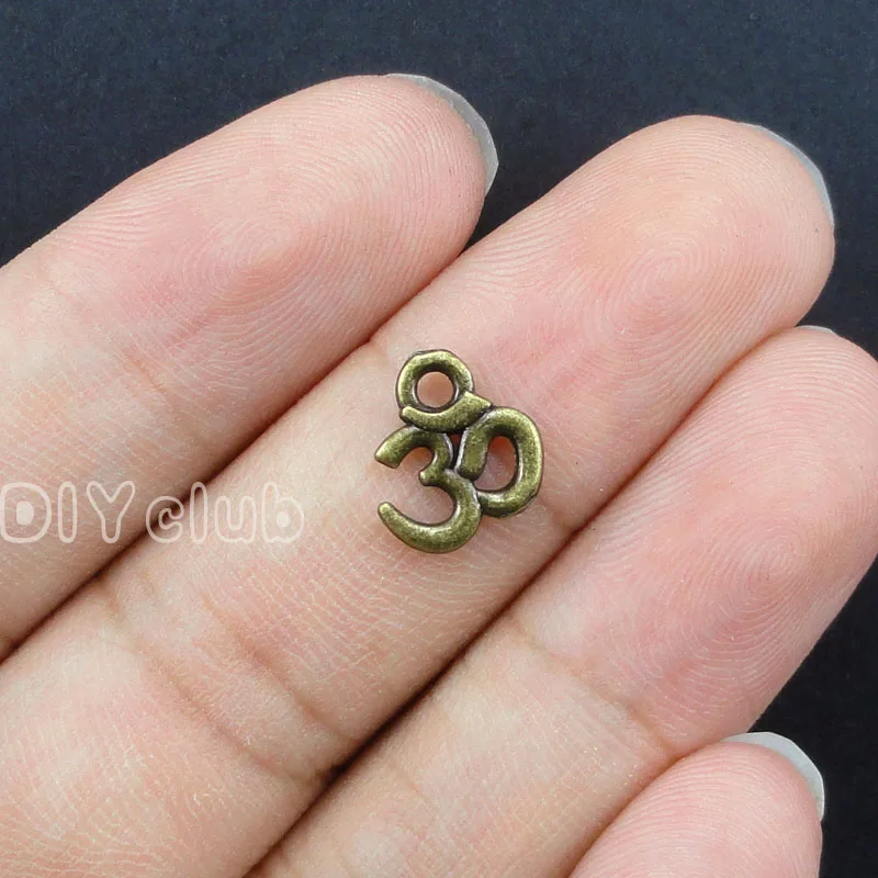 

100pcs- OM Charms, Antique Bronze Small Yoga Symbol charm Pendants 10x10mm