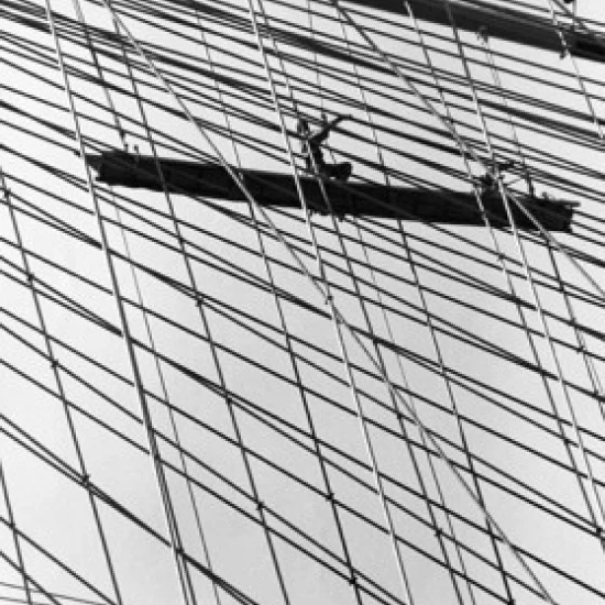Low angle view of a construction worker working at a construction site Poster Print (18 x 24)