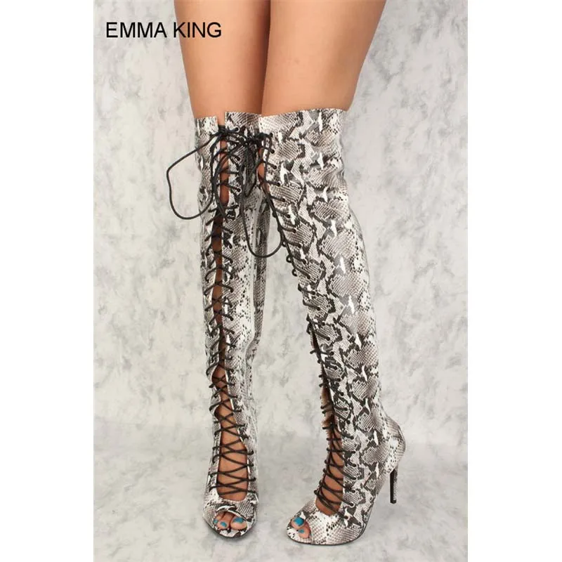 snakeskin print over the knee boots