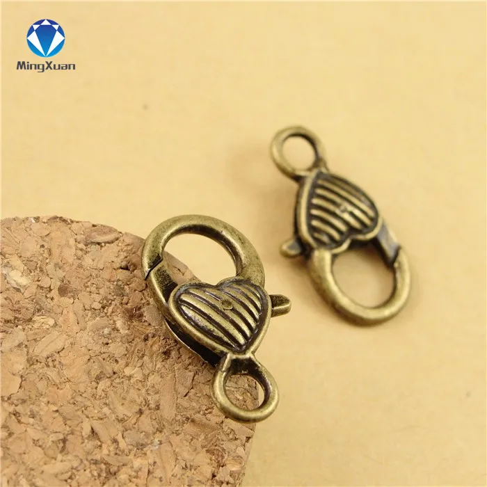 

Latest Designed 10pcs/lot Antique Bronze Plated Heart Lobster Clasp for Necklace 26*13MM