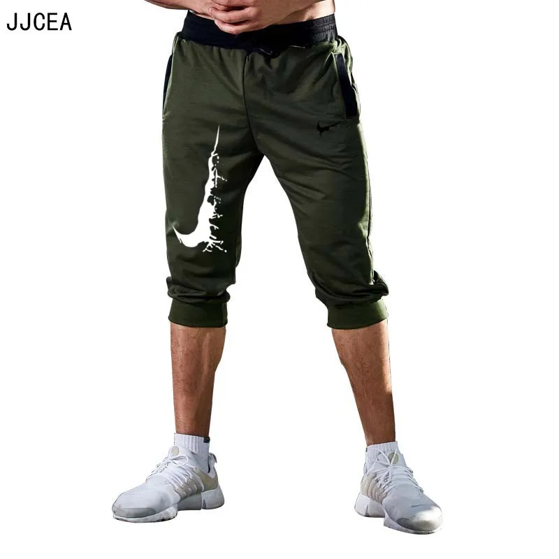 2018 Новый Для мужчин джоггеры Марка Мужской Брюки, тренировочные брюки в повседневном стиле Для мужчин для тренажерного зала хлопок Фитнес