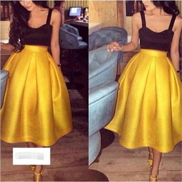yellow skirt and black top