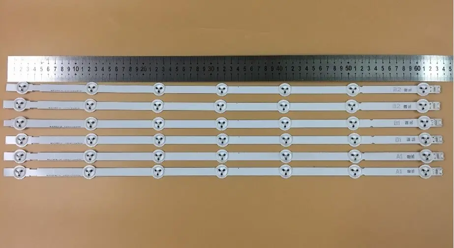 

free shippinfor LG 32 inch LCD back light 6916L-1204A 1205A 1426A 1437A 1438A 1295A 1296A 1440A 1439A 1set=3piece (1piece=7 LED)