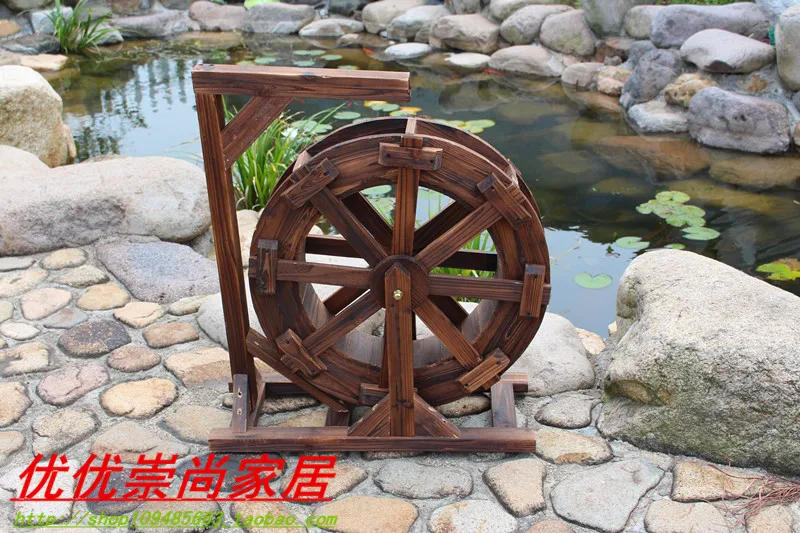 Rueda de agua de madera transporte molino de viento redondo de madera