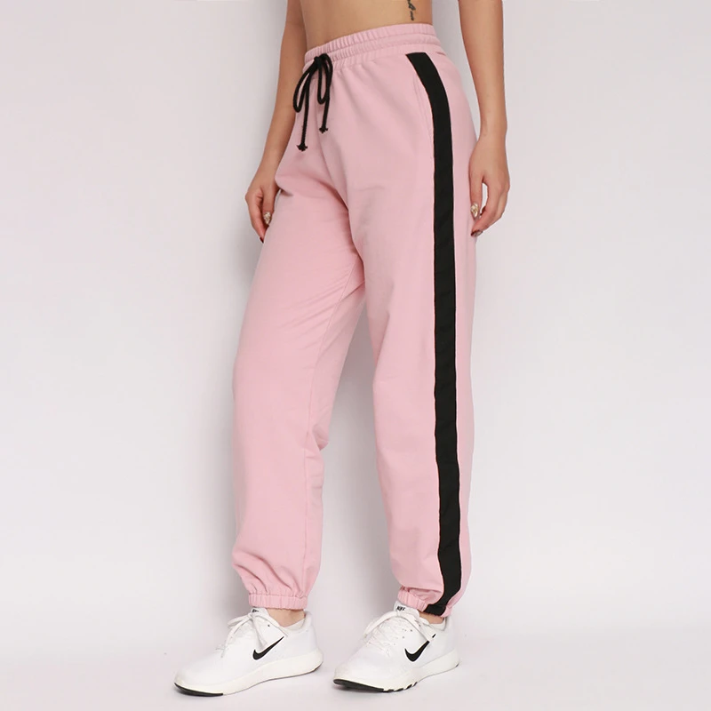 black joggers with pink stripe