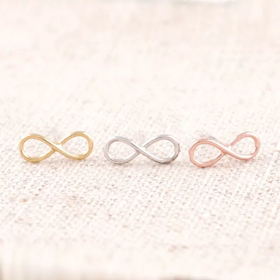 

Jisensp 10pcs/lot New Fashion Cute Infinity Earrings Lovely Elegant Sign Shaped Women Wholesale Ear Stud E005