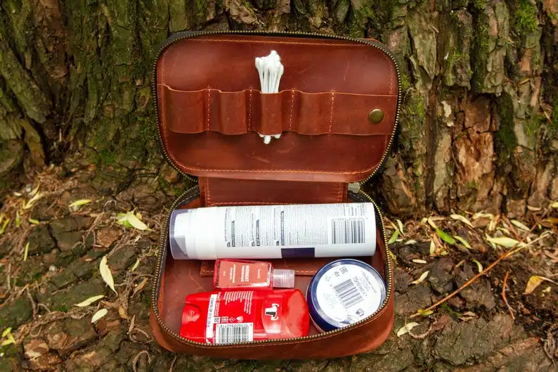 

A compact travel dopp kit is fashionable genuine leather dopp kit makeup cosmetics bags for men women