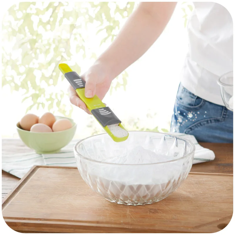 

Easy cooking kitchen Adjustable quantitative spoon, milk spoon headed nine files with a scale measuring spoons