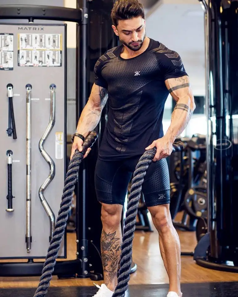 

Hot 2019 Men's Compression Gyms T-shirt Running Fitness Workout Blouse Yoga Sport Suits Mens T Shirt High Elastic Quick-Drying