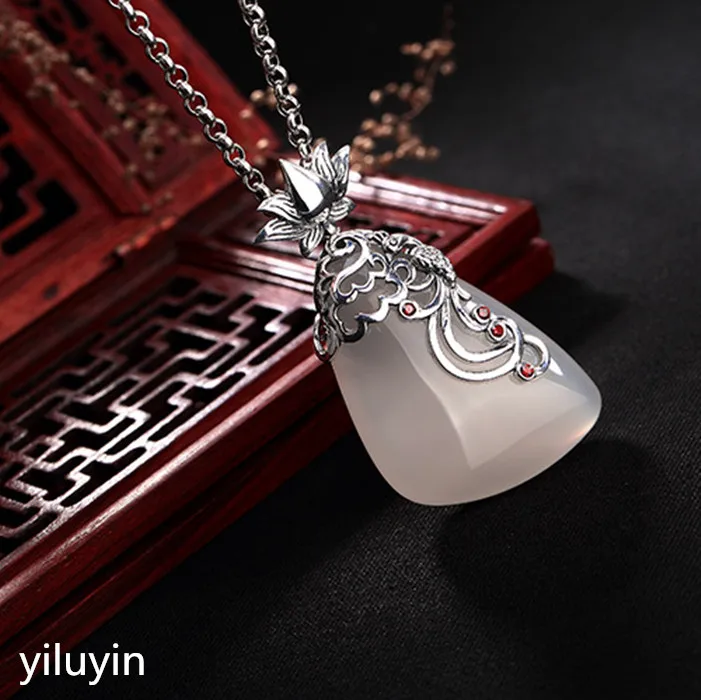 

KJJEAXCMY Fine jewelry S990 pure silver peacock peacock hollowed mosaic jade blue sand stone Hong Kong Jade Pendant