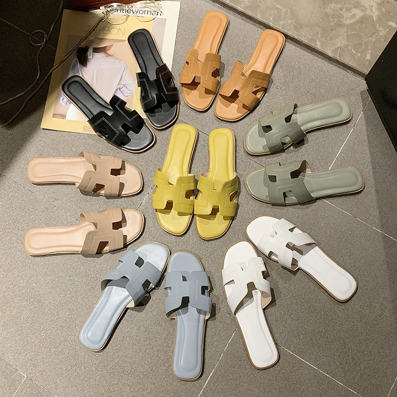 

New style celebrity flat bottom slipper female outside wear fashionable joker to go together colour beach shoe flip flops