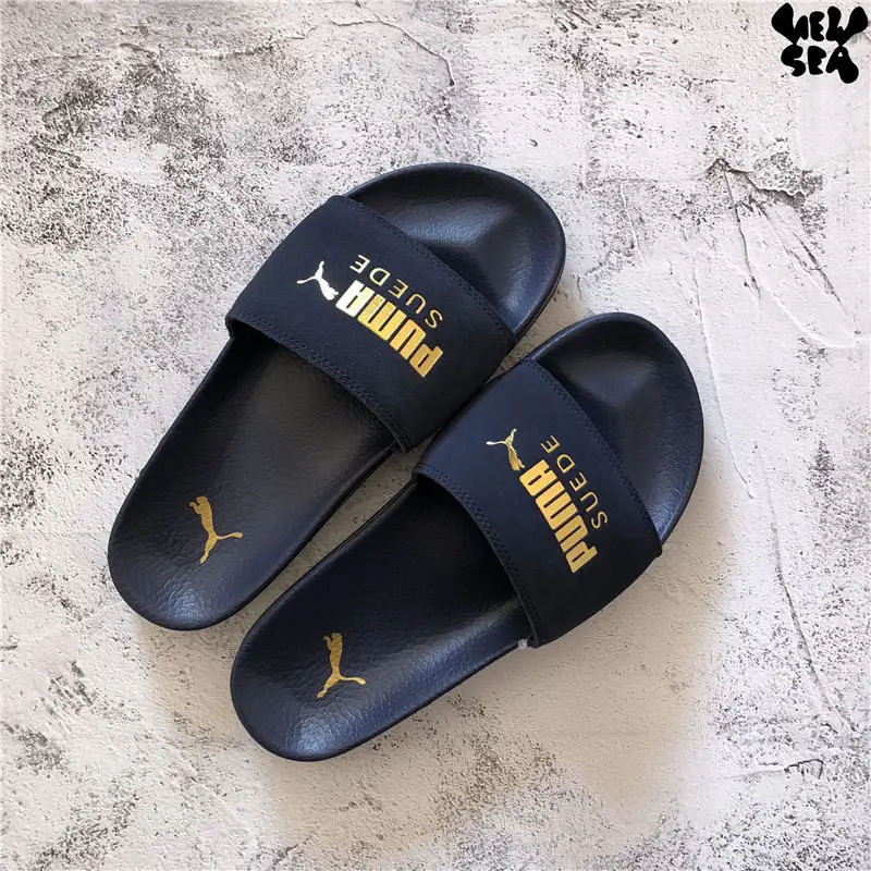 puma leadcat suede slides women's