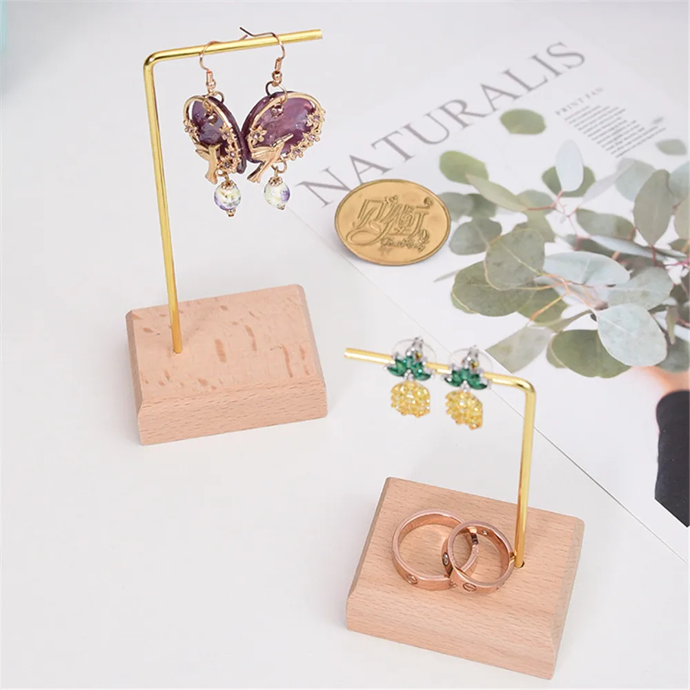 

Nordic Golden Jewelry Display with Wooden Stand Minimalist Modern Chic Ins Metal Jewelry Rack Design Models Earrings Bracelet