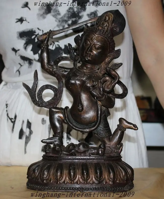 

12"Old Tibet Tantra Buddhism Bronze Hold Sword Exorcism Goddess Kwan-yin StatueA