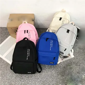 

Couple models solid color simple canvas large capacity computer bag unisex student backpack travel backpack women