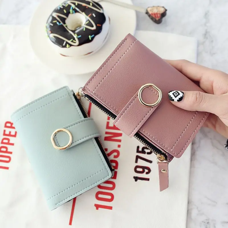 

2019 new Female wallet simple short lady wallet zipper buckle simple solid color student cute small wallet.